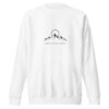 Premium Mountain Sunrise Sweatshirt featuring a minimalist mountain and rising sun graphic on a white unisex crewneck sweatshirt